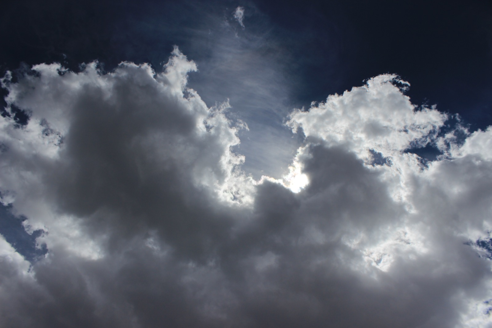Dramatic cloud photograph used as a visual accent for systems work